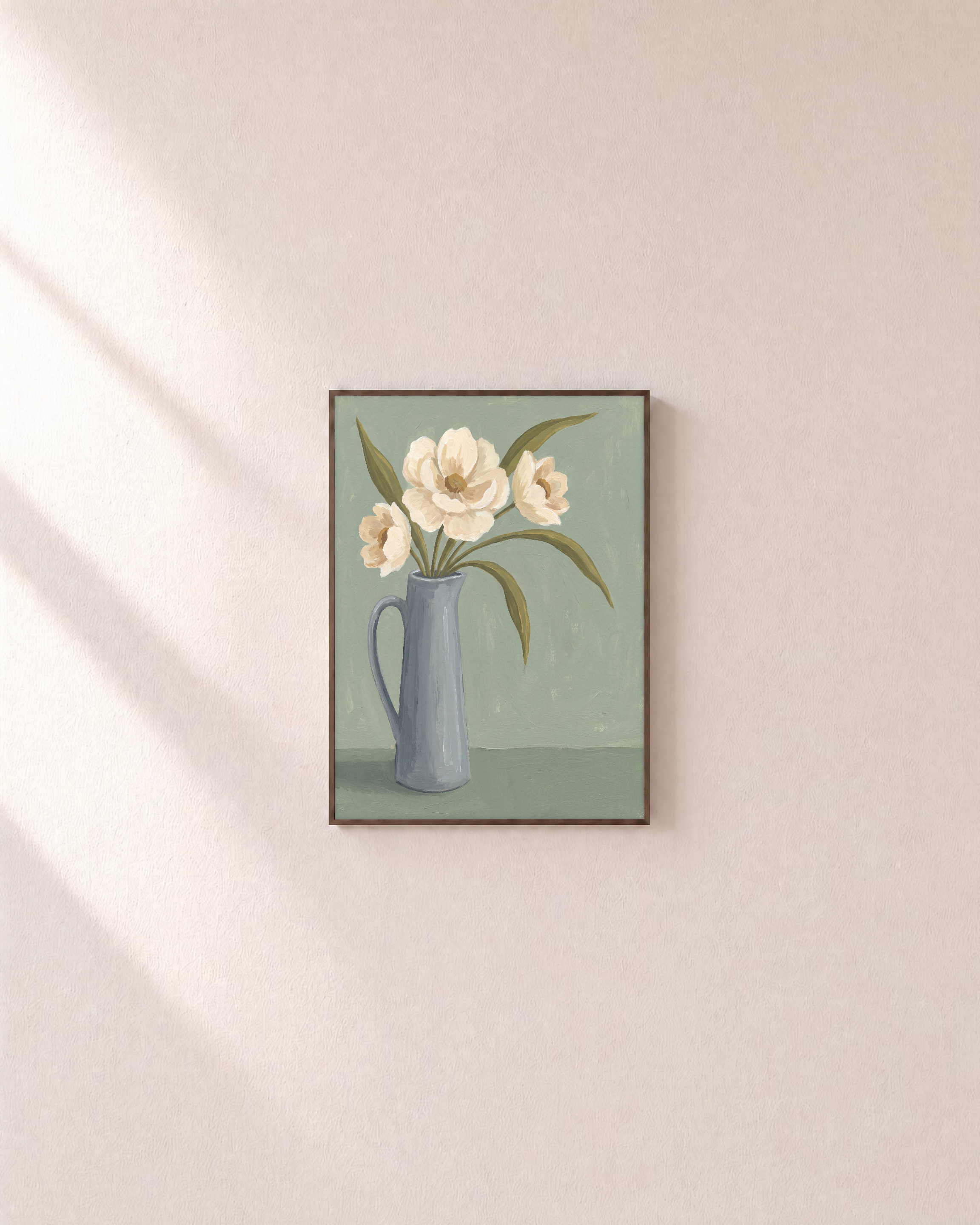 Ivory Pitcher Blooms Studio edition unframed print is shown framed for styling in a plain wall; Frame not included