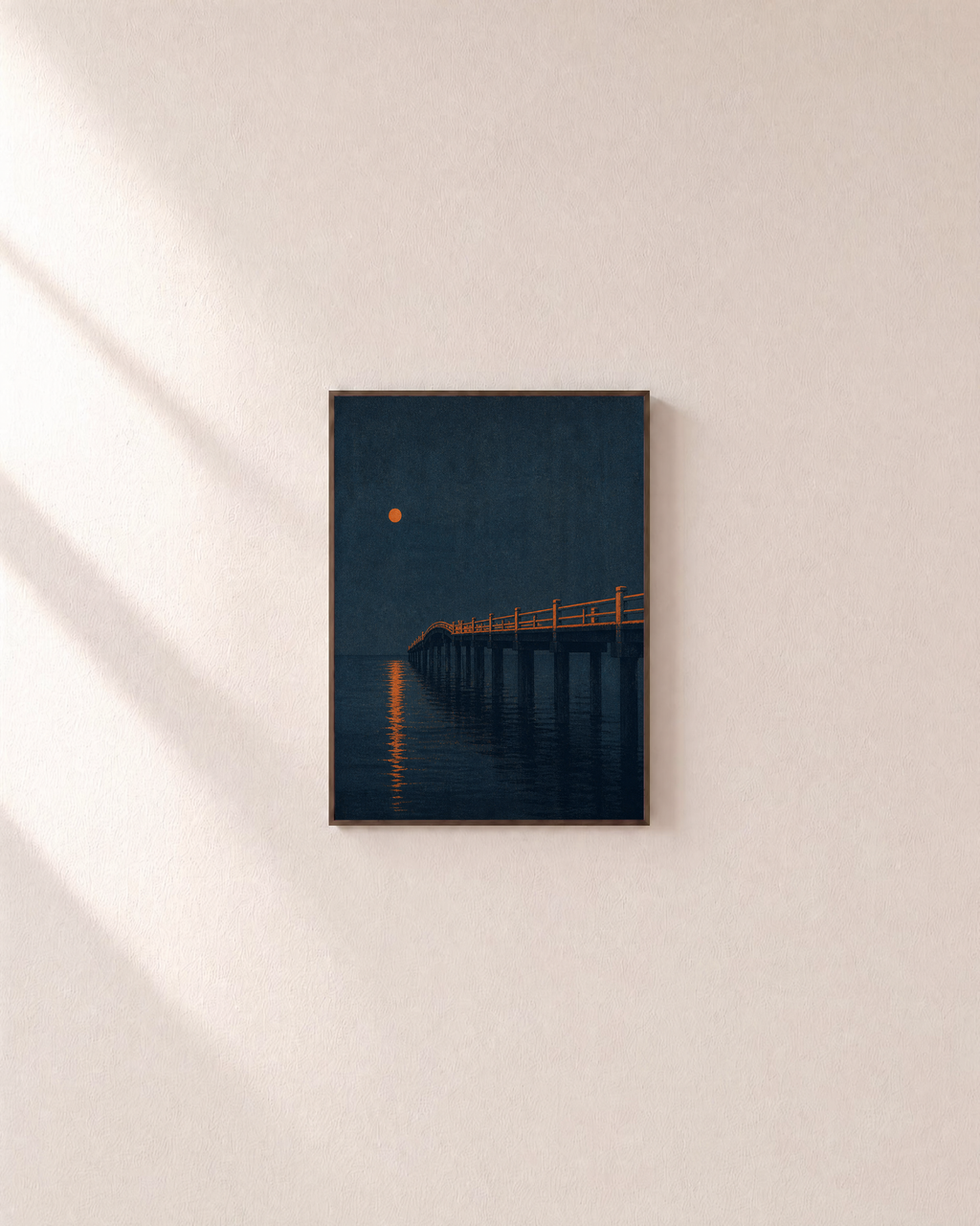 Night Pier moonlit pier print: unframed print is shown framed for styling on a plain wall; frame not included