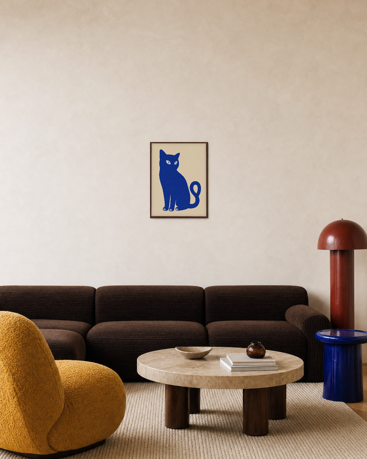 Idle Cat blue cat wall art: unframed print is shown framed for styling in a living room; frame not included
