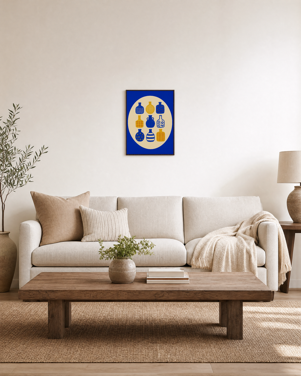 Bottle Hour cobalt bottle wall art: unframed print is shown framed for styling in a living room; frame not included