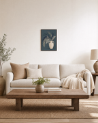 Off-Center Cream Amphora teal botanical wall art print: unframed print is shown framed for styling in a living room; frame not included