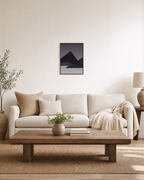 Charcoal Ridges unframed print is shown framed for styling in a living room; frame not included