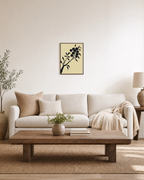 Diagonal Fruiting Branch fruiting branch silhouette wall art print: unframed print is shown framed for styling in a living room; frame not included