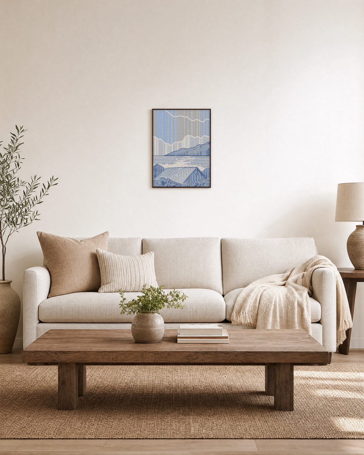 One Roof blue landscape wall art: unframed print is shown framed for styling in a living room; frame not included