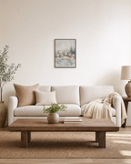 Snow Village mist village print: unframed print is shown framed for styling in a living room; frame not included