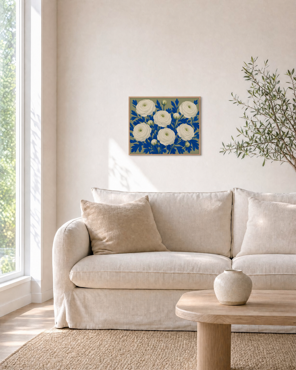 Ranunculus Thicket white ranunculus wall art: unframed print is shown framed for styling in a living room; frame not included