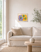 Three Figs unframed print is shown framed for styling in a living room; frame not included