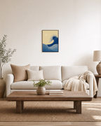 Indigo Wave Crest unframed print is shown framed for styling in a living room; frame not included