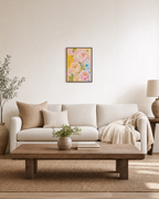 Peony Weather pastel peony wall art: unframed print is shown framed for styling in a living room; frame not included