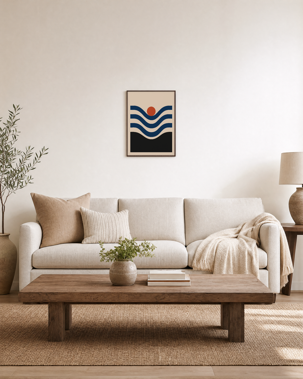 Coral Nest navy wave coral wall art: unframed print is shown framed for styling in a living room; frame not included