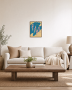 Sweet Peas Across Teal Slab unframed print is shown framed for styling in a living room; frame not included