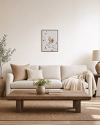 Passing Robin rosehip robin print: unframed print is shown framed for styling in a living room; frame not included