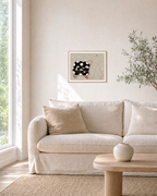 Carry Pattern unframed print is shown framed for styling in a living room; frame not included