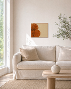 Two Shells From Left unframed print is shown framed for styling in a living room; frame not included