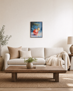Snowfall Bauble coral bauble print: unframed print is shown framed for styling in a living room; frame not included