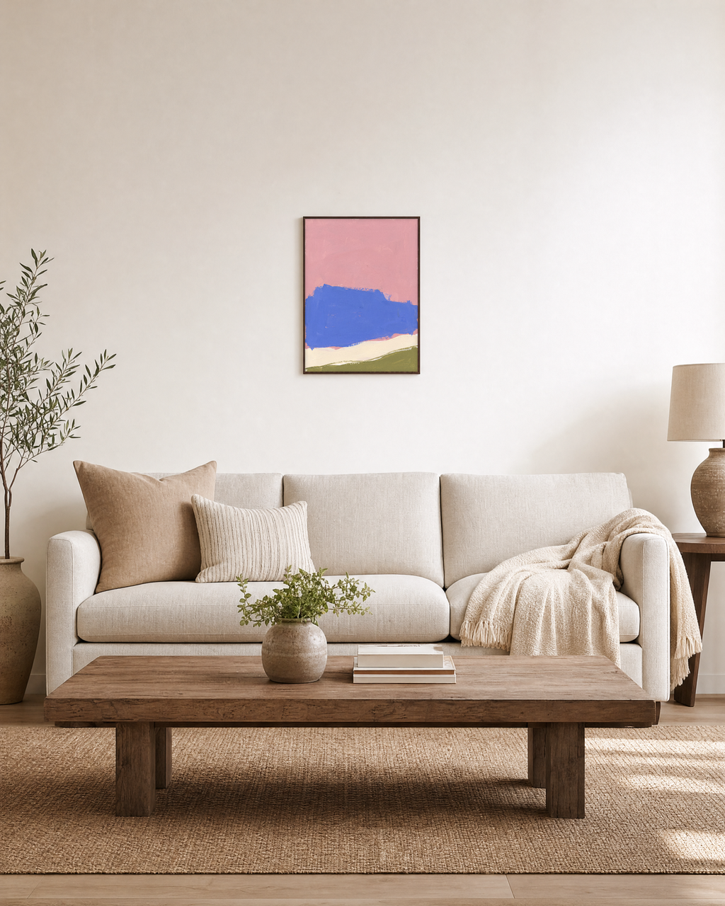 Blue Cliff Pink unframed print is shown framed for styling in a living room; frame not included