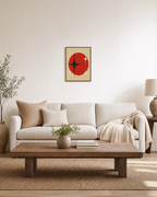 Atomic Signal red atomic spark wall art: unframed print is shown framed for styling in a living room; frame not included