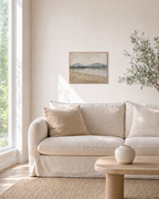 Still Morning landscape prints: unframed print is shown framed for styling in a living room; frame not included