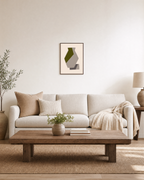 Olive Vessel unframed print is shown framed for styling in a living room; frame not included