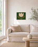 Tulip Hour cream tulip wall art: unframed print is shown framed for styling in a living room; frame not included