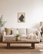 Olive Tilt olive green abstract vase wall art print: unframed print is shown framed for styling in a living room; frame not included