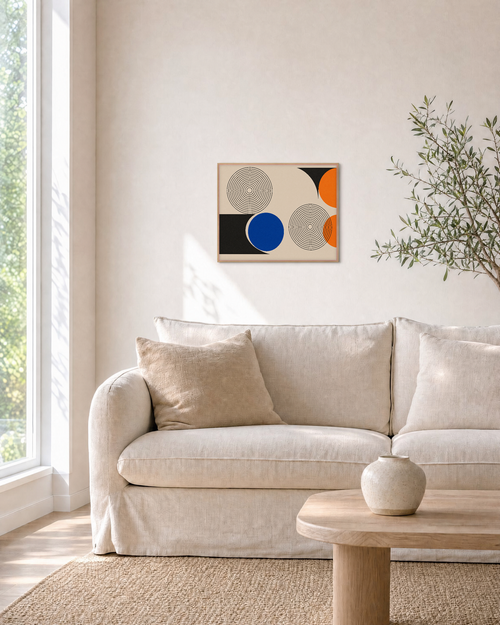 Blue Reply concentric ring wall art: unframed print is shown framed for styling in a living room; frame not included