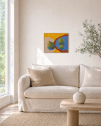 Three Figs on a Plate Edge figs on a blue plate wall art print: unframed print is shown framed for styling in a living room; frame not included