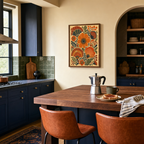 The Garden Fan burnt orange folk flower wall art: unframed print is shown framed for styling in a graphic navy kitchen; frame not included
