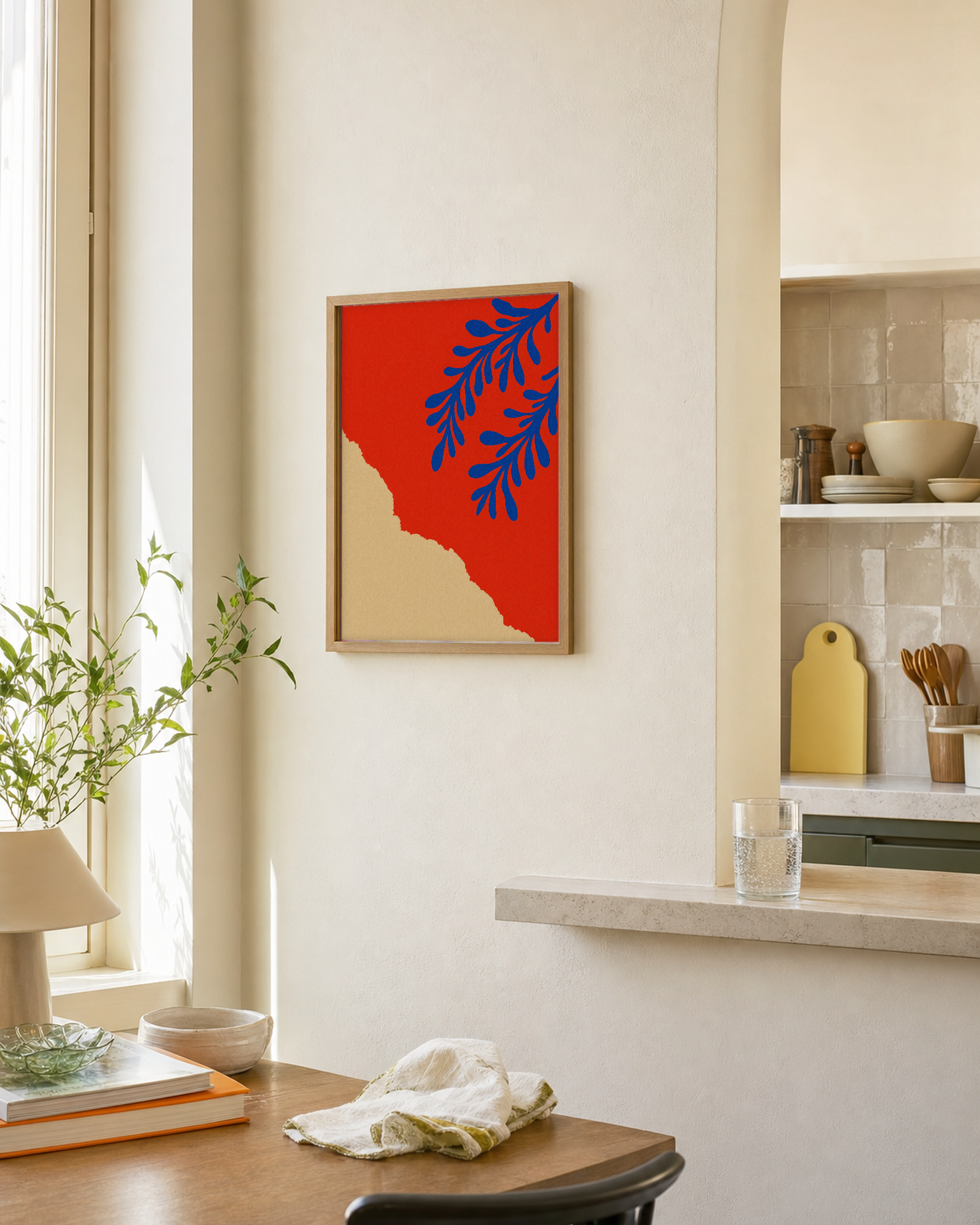 Two Coral Sprigs Blue unframed print is shown framed for styling in a kitchen pass-through; frame not included