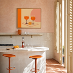Spritz Pair spritz glass wall art: unframed print is shown framed for styling in a riviera apartment kitchen; frame not included