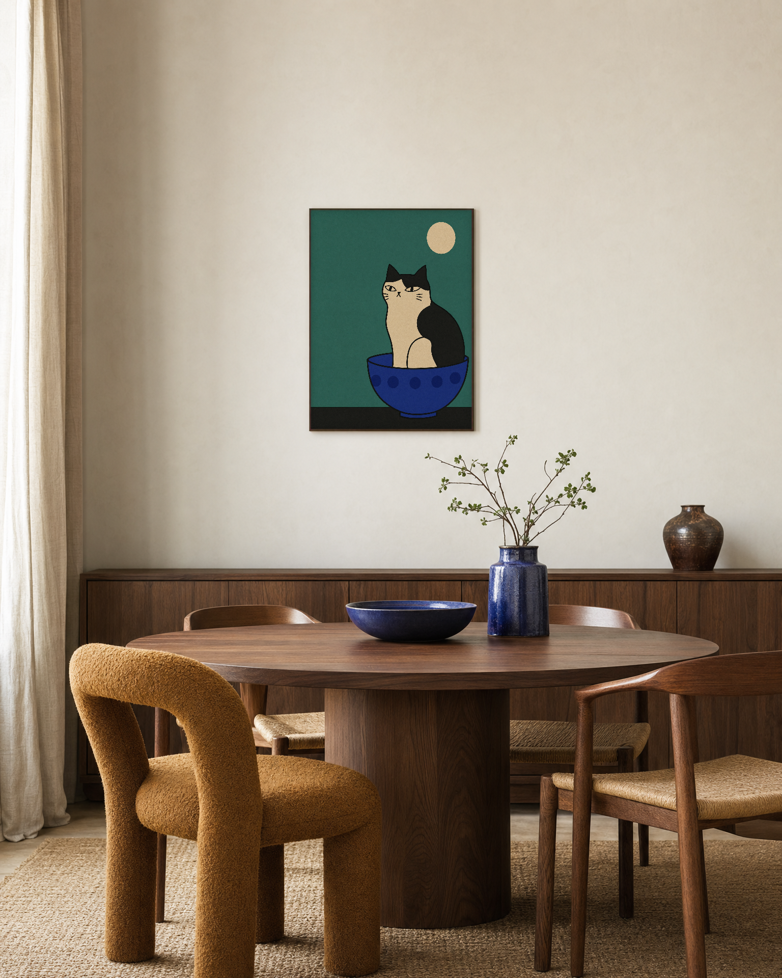 One Cat Cobalt Bowl unframed print is shown framed for styling in a dining room; frame not included