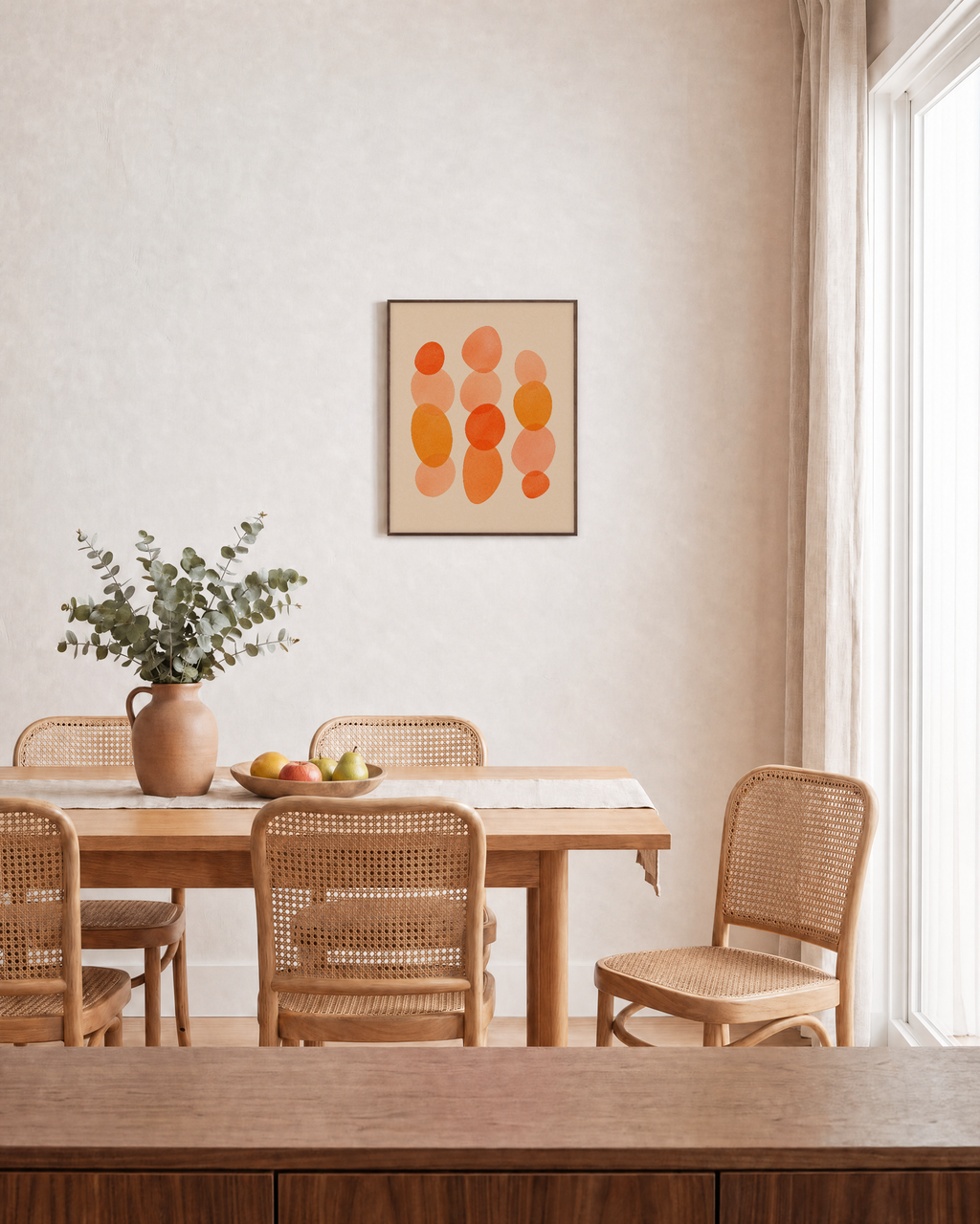 Afternoon Stack warm oval stack wall art: unframed print is shown framed for styling in a dining room; frame not included
