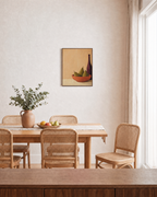 Coral Bowl and Purple Bottle pears and purple bottle wall art print: unframed print is shown framed for styling in a dining room; frame not included