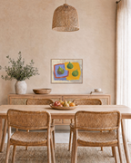Sunday Figs fig wall art: unframed print is shown framed for styling in a dining room; frame not included