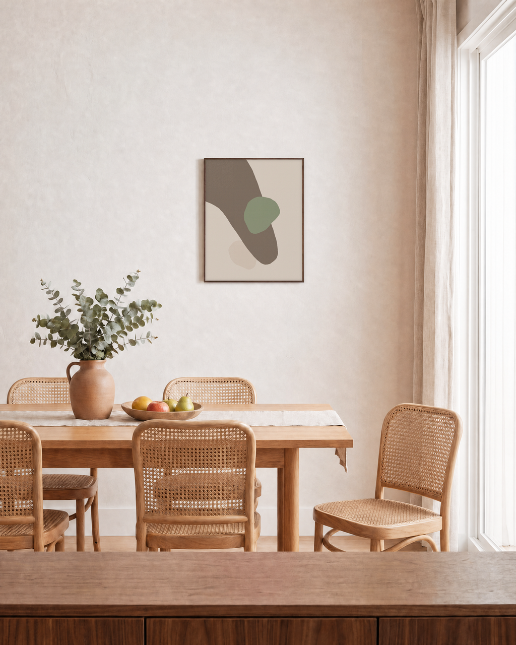 Taupe Curve with Sage Oval taupe and sage abstract wall art: unframed print is shown framed for styling in a dining room; frame not included