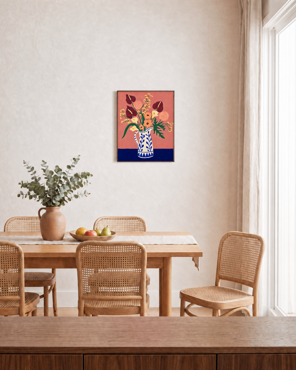 Burgundy and peach flower vase print displayed in a dining room