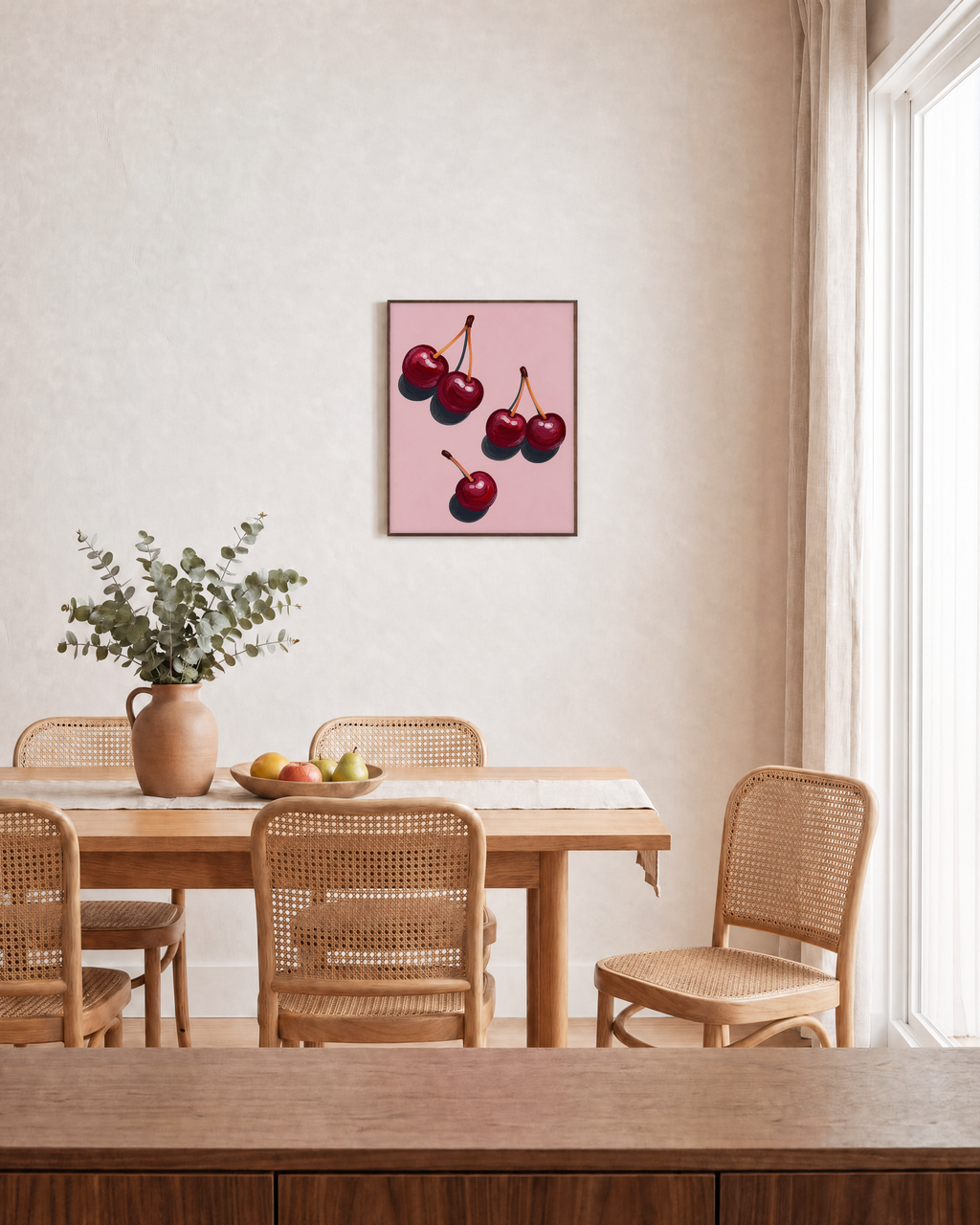 Cherry Scatter cherry art print: unframed print is shown framed for styling in a dining room; frame not included