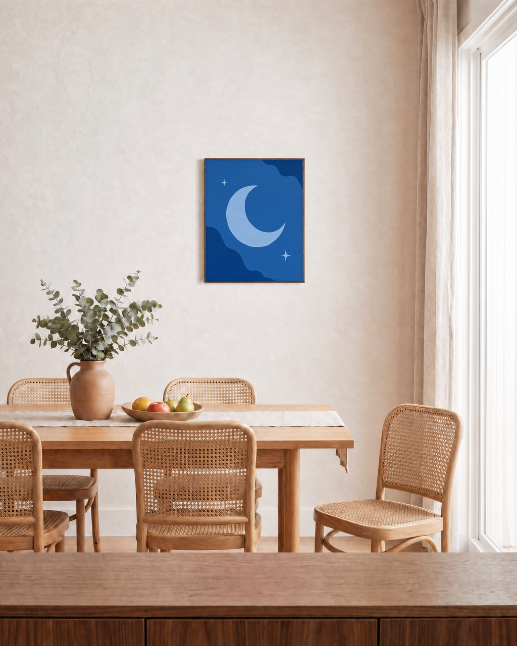 Blue Crescent unframed print is shown framed for styling in a dining room; frame not included