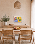 Three Figs unframed print is shown framed for styling in a dining room; frame not included