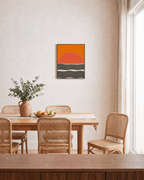 Low Sun orange sun ripple wall art: unframed print is shown framed for styling in a dining room; frame not included