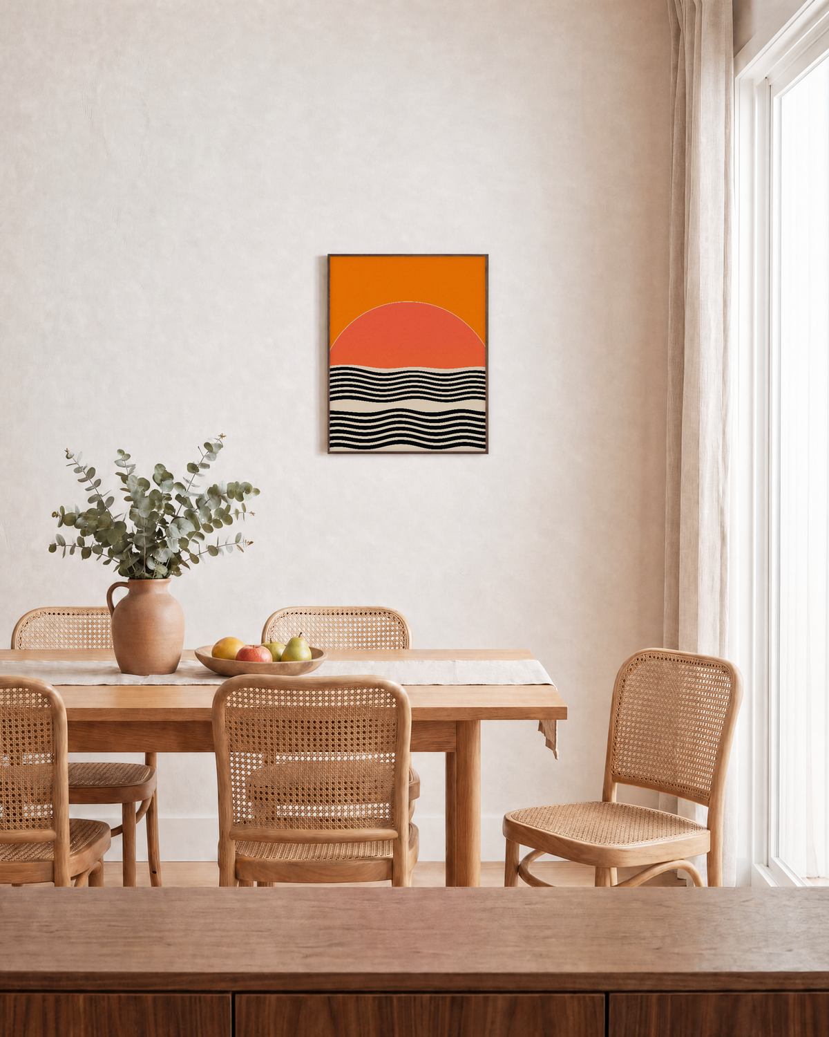 Low Sun orange sun ripple wall art: unframed print is shown framed for styling in a dining room; frame not included