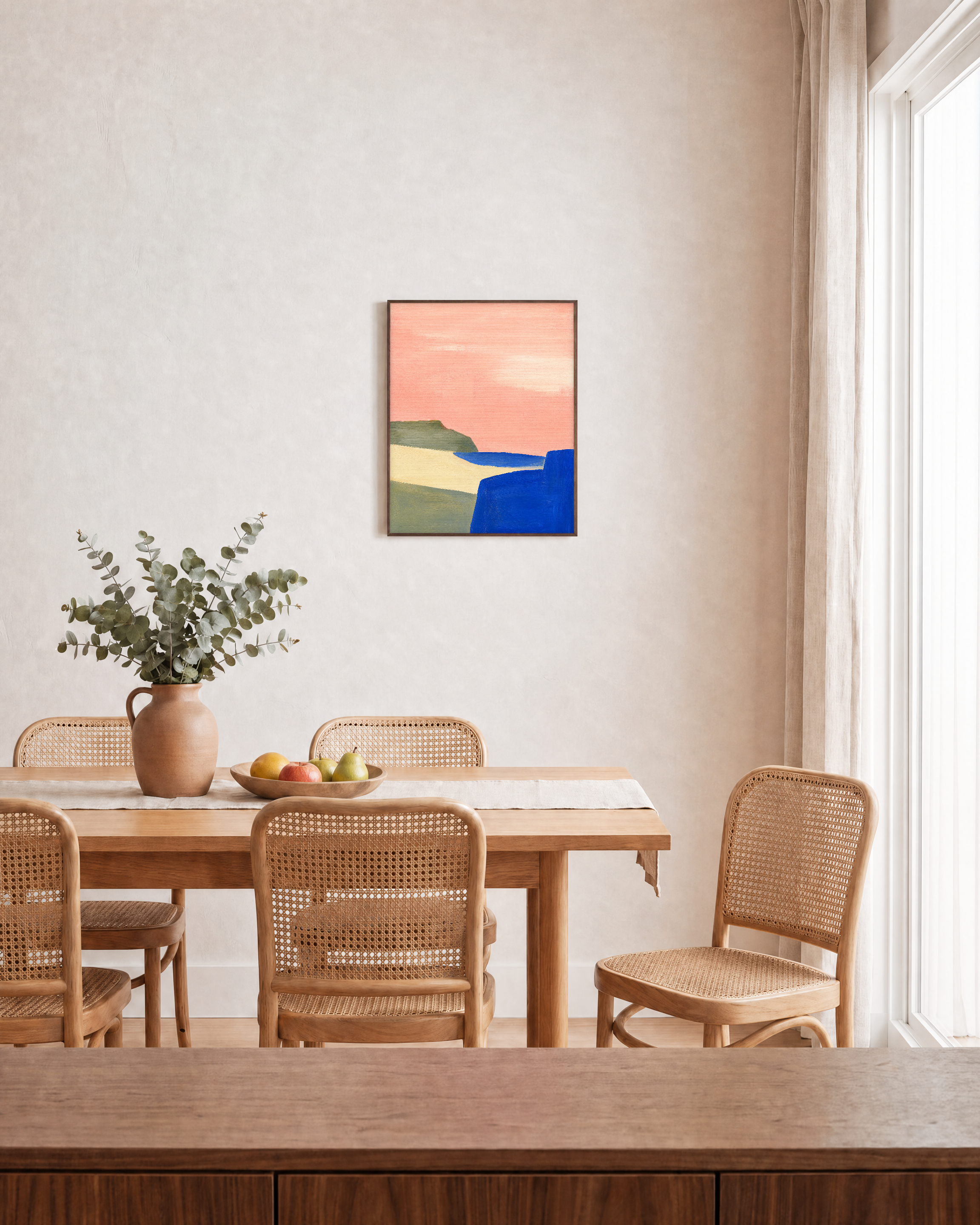 Blue Cliff Pink unframed print is shown framed for styling in a dining room; frame not included