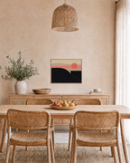Dusk Hill black hill wall art: unframed print is shown framed for styling in a dining room; frame not included
