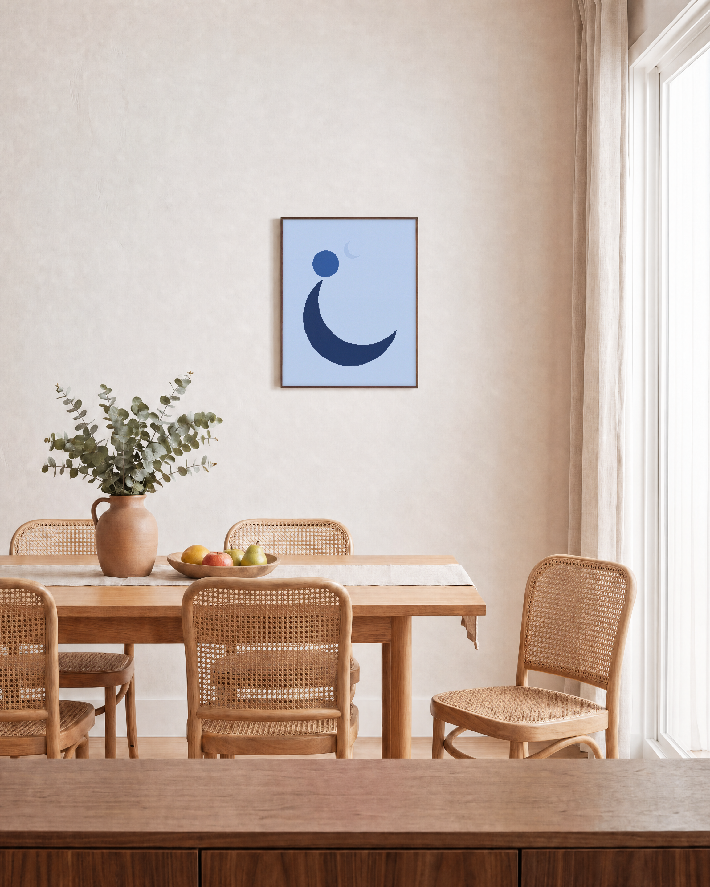 Blue Crescent unframed print is shown framed for styling in a dining room; frame not included