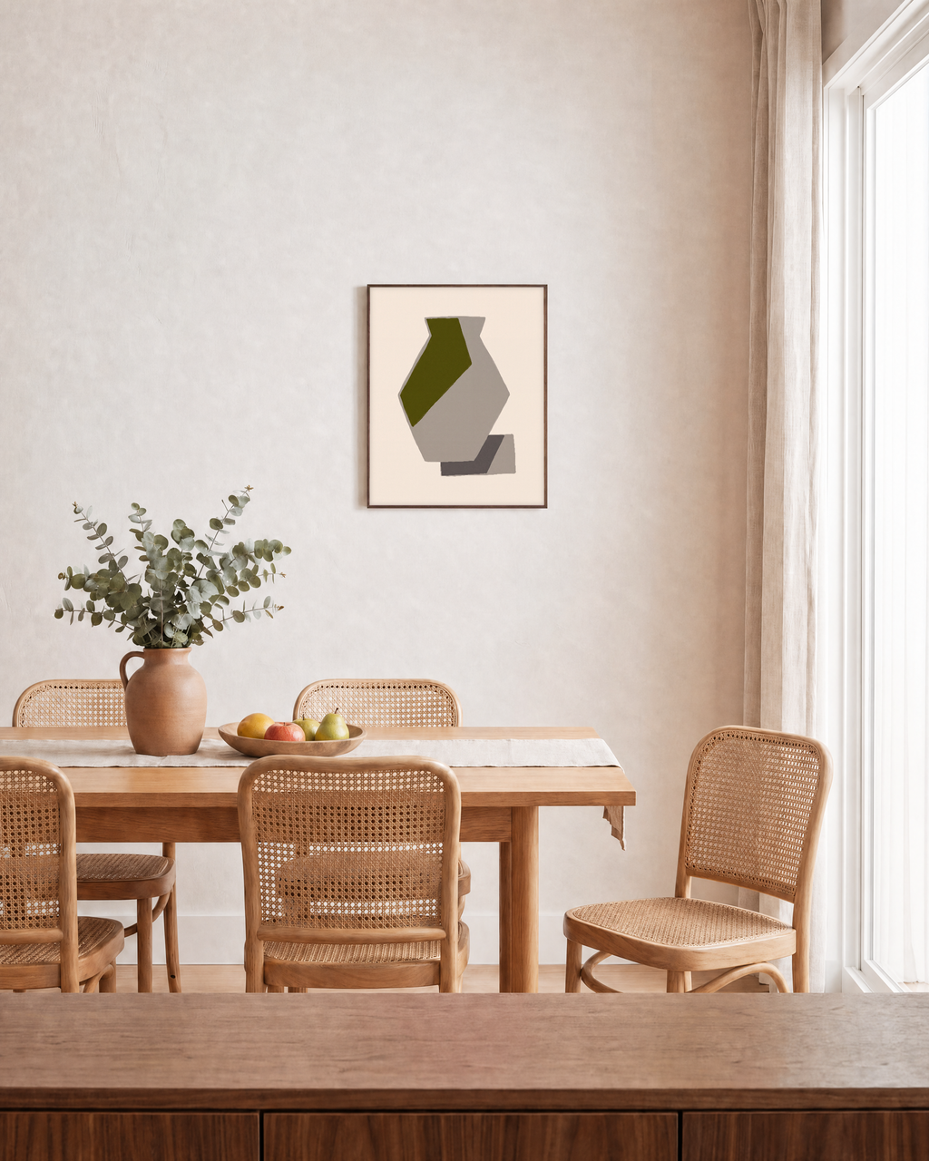 Olive Vessel unframed print is shown framed for styling in a dining room; frame not included