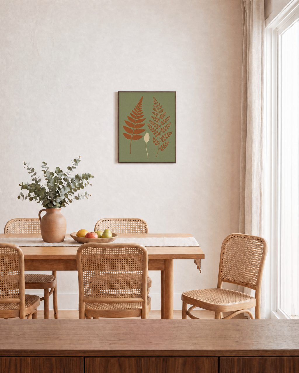 Fern Pair fern art prints: unframed print is shown framed for styling in a dining room; frame not included