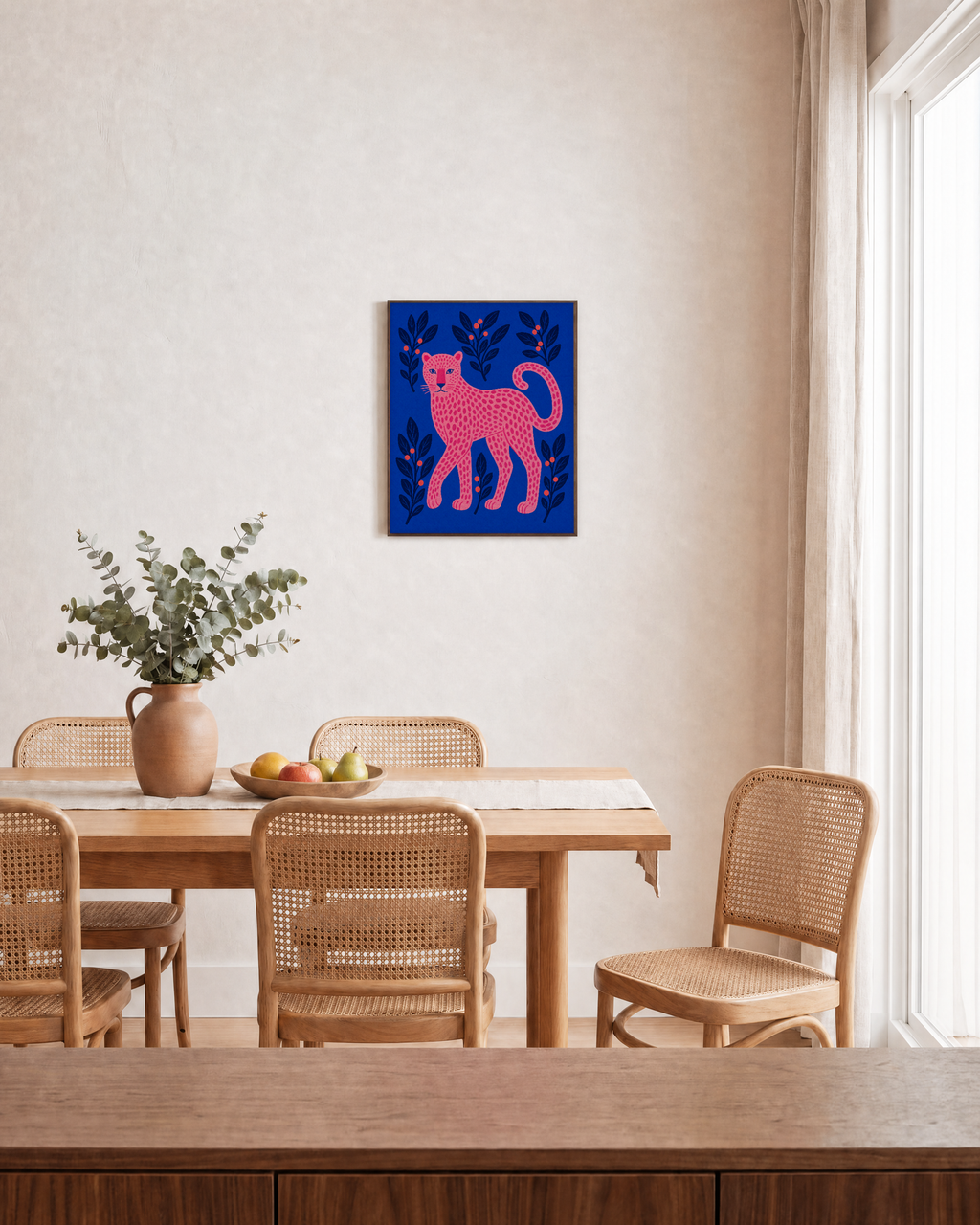 Leopard Patrol leopard wall art: unframed print is shown framed for styling in a dining room; frame not included