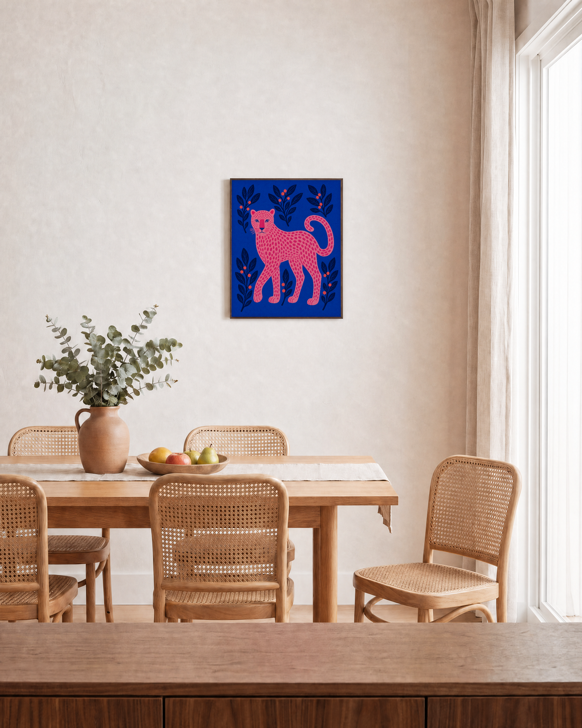 Leopard Patrol leopard wall art: unframed print is shown framed for styling in a dining room; frame not included
