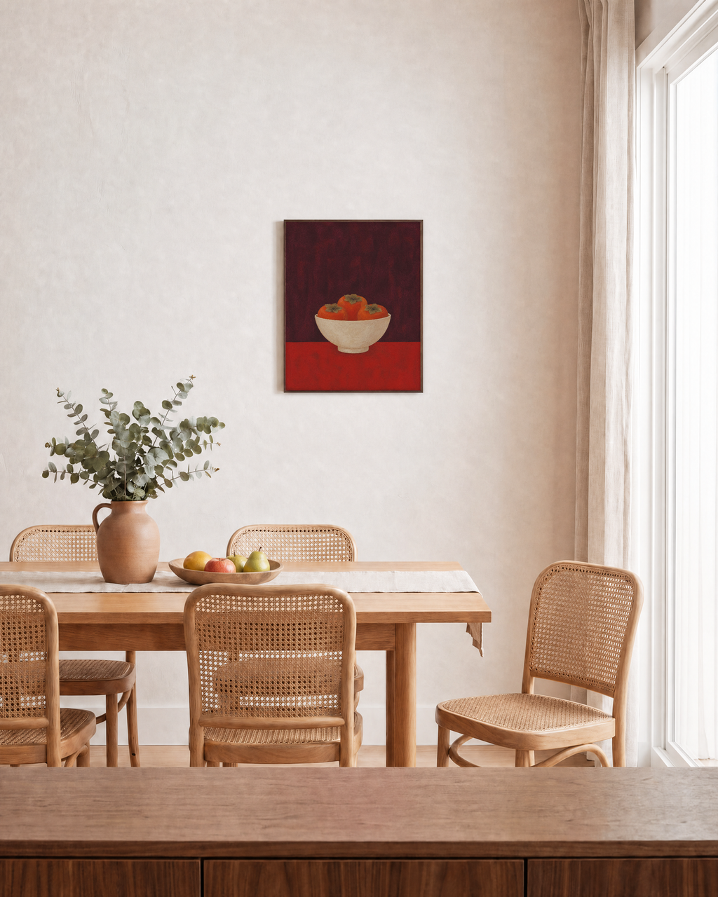 One Bowl Three Persimmons unframed print is shown framed for styling in a dining room; frame not included