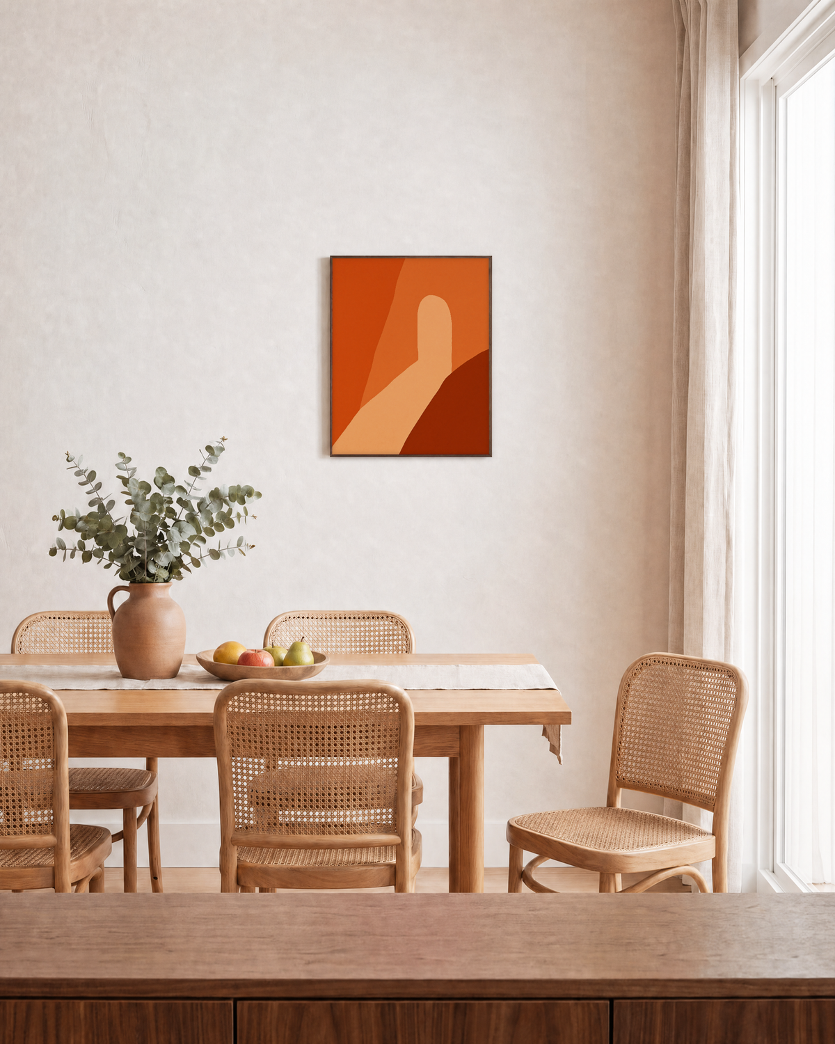 Orange Shapes on Beige Field overlapping orange shapes wall art print: unframed print is shown framed for styling in a dining room; frame not included